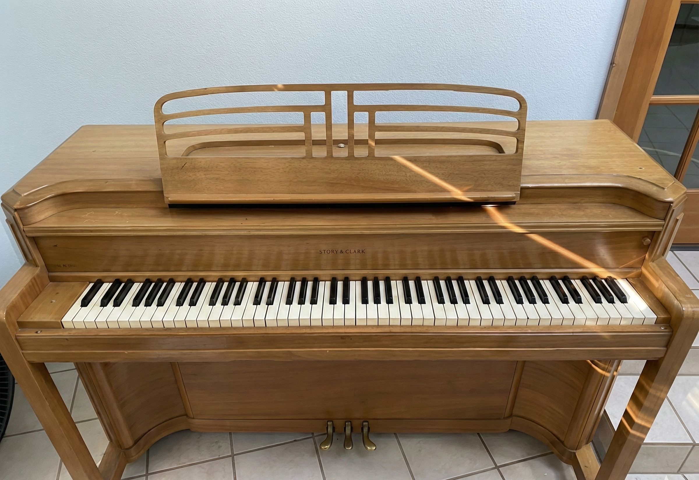 Piano in game room